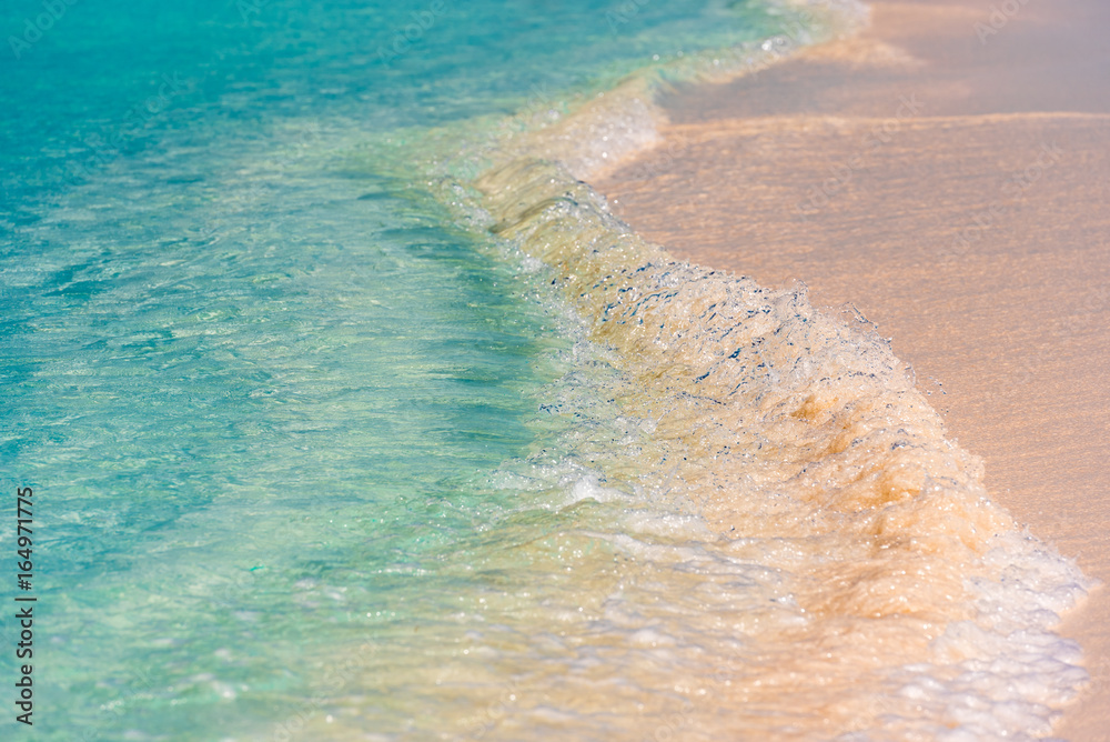 Beach wave close-up of Cayo Largo, Cuba. Сlose-up.
