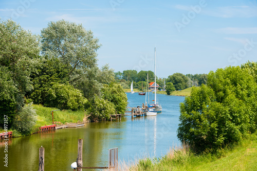 View of the boats in the harbor, Hooksiel, Wangerland, Germany. Copy space for text. photo