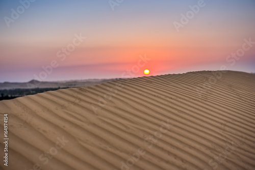 Sunset in the desert. sand dunes