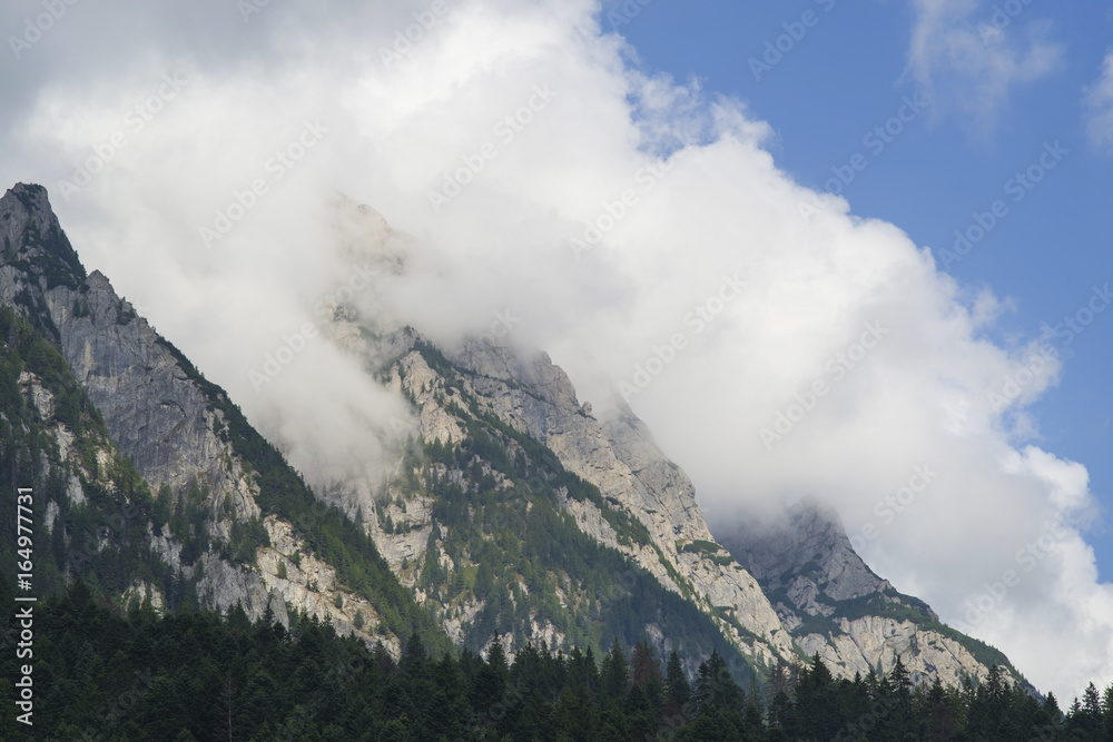 Mountain peak with cloud layer