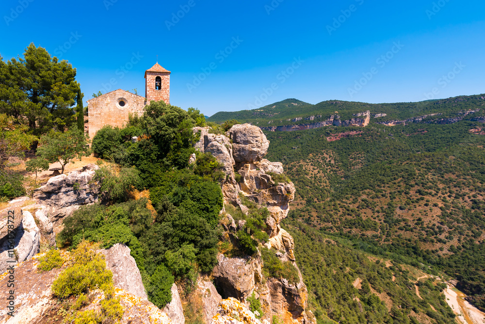 View of the Romanesque church of Santa Maria de Siurana, in Siurana de Prades, Tarragona, Catalunya, Spain. Copy space for text.