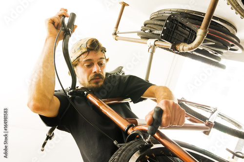 bicycle shop  bike workshop with man working