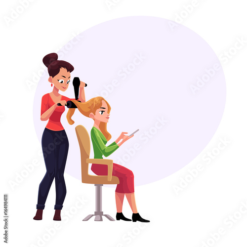 Hairdresser drying long hair of blond woman who uses smartphone, cartoon vector illustration with space for text.Hairdresser woman drying hair for her client with hairbrush and hair dryer