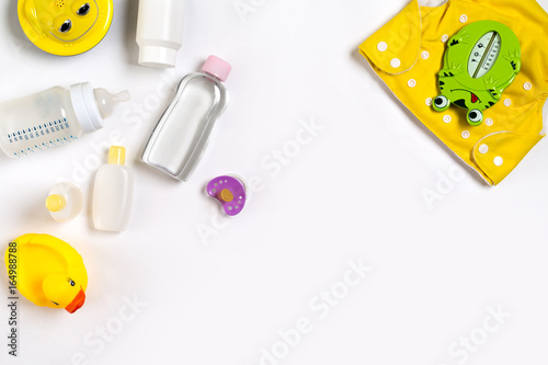 Cosmetics for newborns on a white background. Top view photo