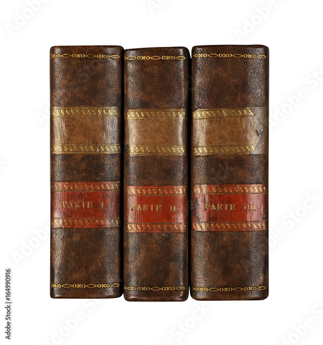 Old books on a bookshelf with beautiful spines