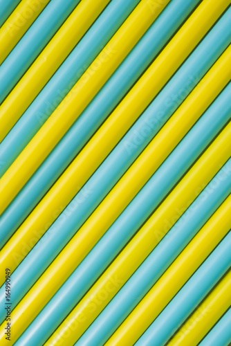 Colorful drinking straws as background