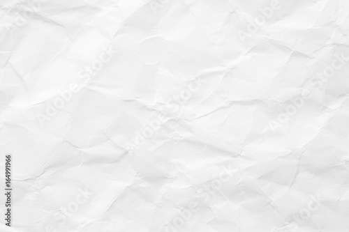 The texture of white paper is crumpled. Background for various purposes. photo