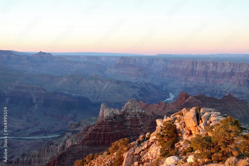 Grand Canyon sunset from South rim with Colorado river.