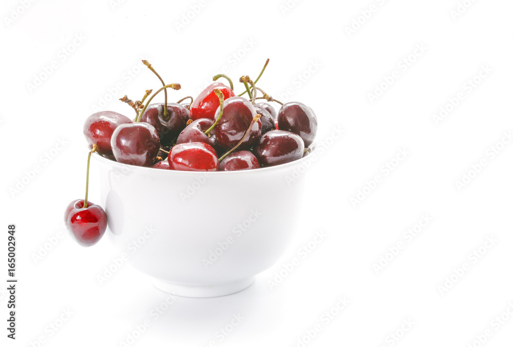 Fresh Cherries in white bowl. Cherries isolated on white background. Fresh Cherries in white bowl. Cherries isolated on white background.