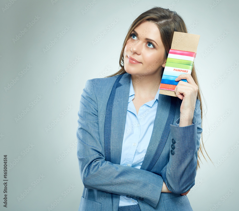 Young Businesswoman thinking about holidays. Young Businesswoman thinking about holidays.