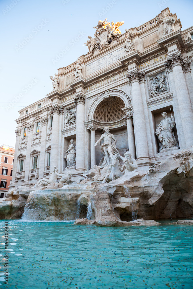 Trevi fountain, Rome, Italy. Rome facade architecture and landmark. Rome Trevi fountain is one of the main attractions of Rome and Italy. The tradition of throwing coins into fountain.Background