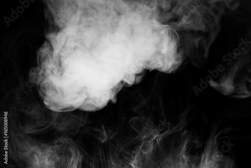 close up of steam smoke on black background.