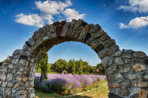 Stone arch at a lavender field
