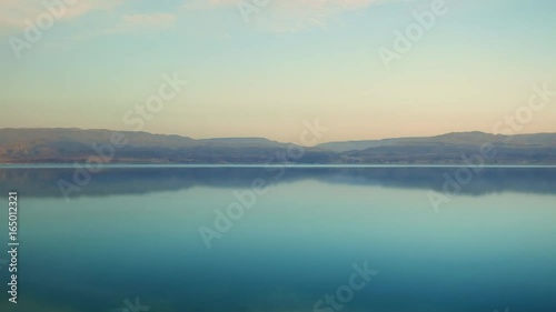 Wallpaper Mural Mountain lake sunset panoramic shot. The water in the desert mountain lake has extremely turquoise and blue water. Wild nature scene. Torontodigital.ca