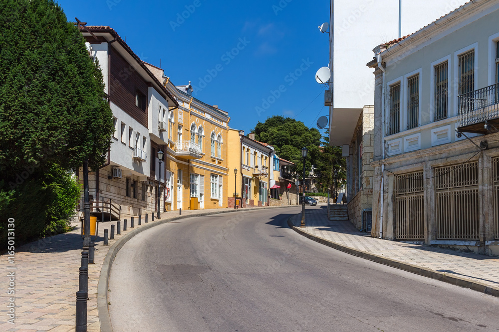 View of the street in balchik town, road and old historic houses in Bulgaria