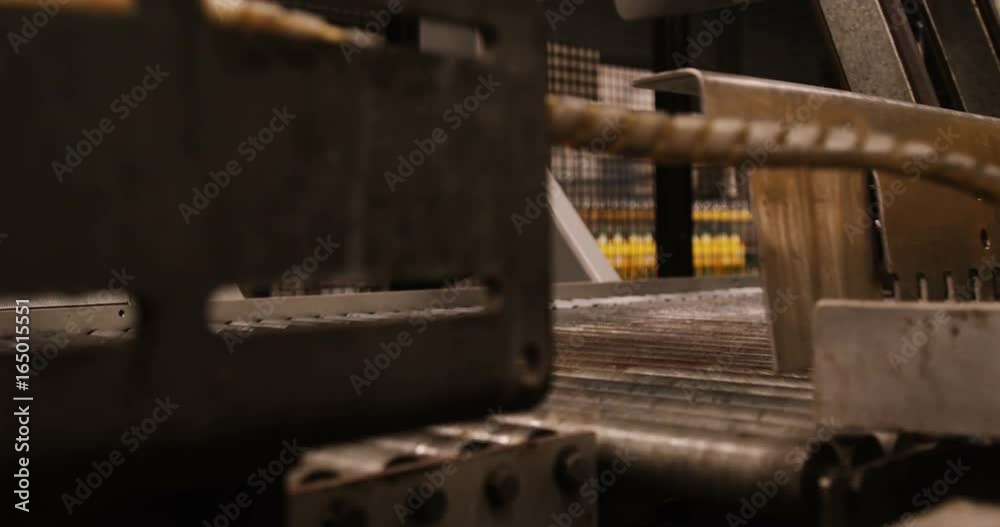 Machine separating juice bottles Machine separating juice bottles