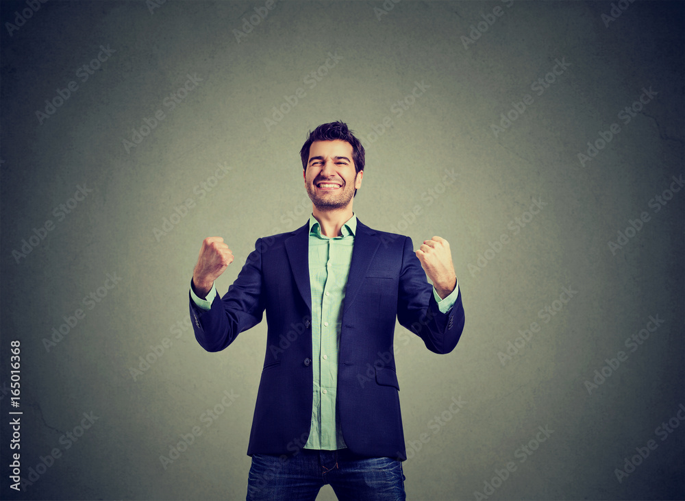 Successful business man winning celebrating success Successful business man winning celebrating success