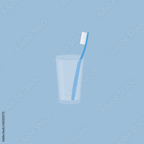 Toothbrush In A Cup. Transparent Glass With Blue Toothbrush