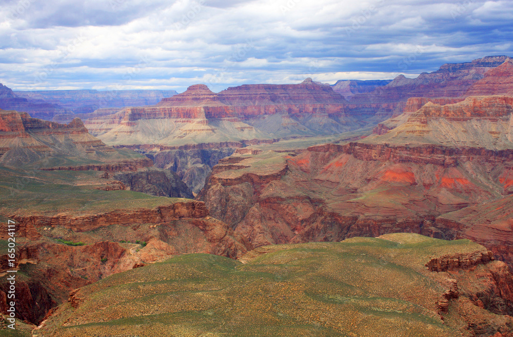Grand Canyon aerial view landscape. Amazing relief background in the Grand Canyon National Park, Arizona, USA. View from Kaibab trail, South Rim. Nature background. Hiking in the Grand Canyon.