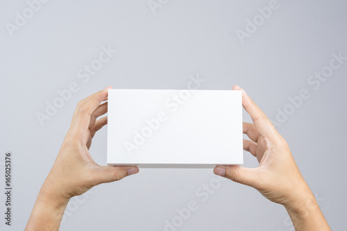 Hand holding blank white box give gift