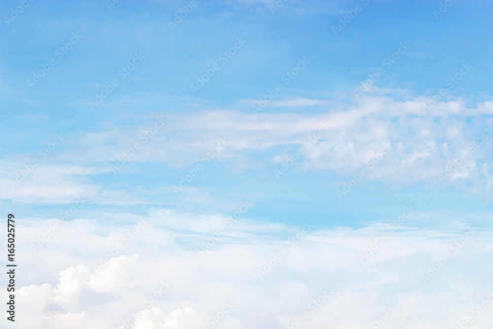 Soft white clouds against blue sky background and empty space for your design