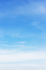 Soft white clouds against blue sky background and empty space for your design