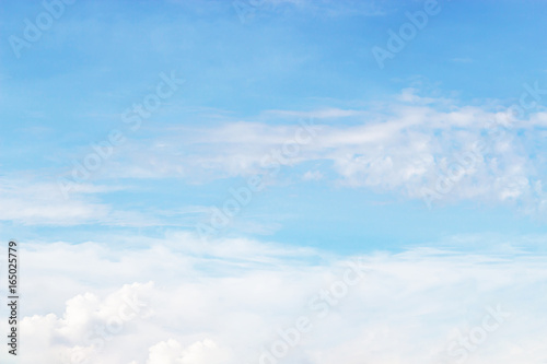 Soft white clouds against blue sky background and empty space for your design