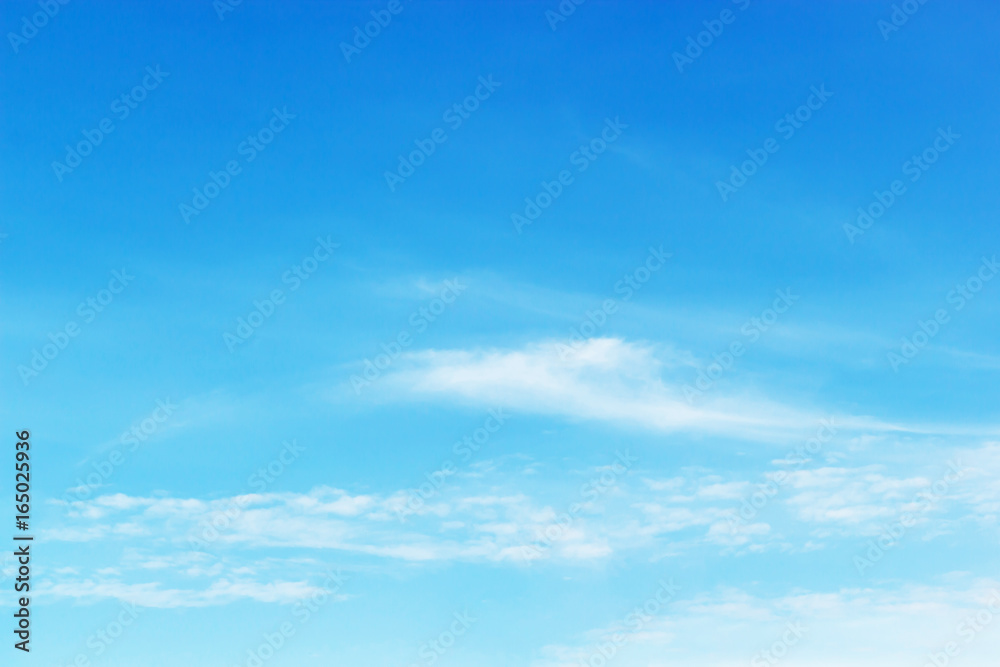 Soft white clouds against blue sky background and empty space for your design