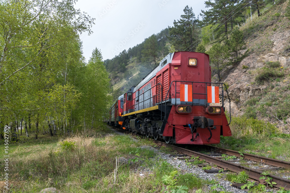 Fototapeta premium Tourist train rides on the Circum-Baikal Railway