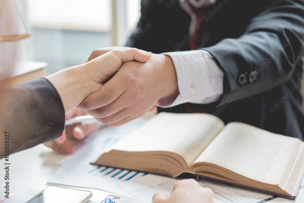 Client and lawyer have a sit down face to face meeting to discuss Client and lawyer have a sit down face to face meeting to discuss