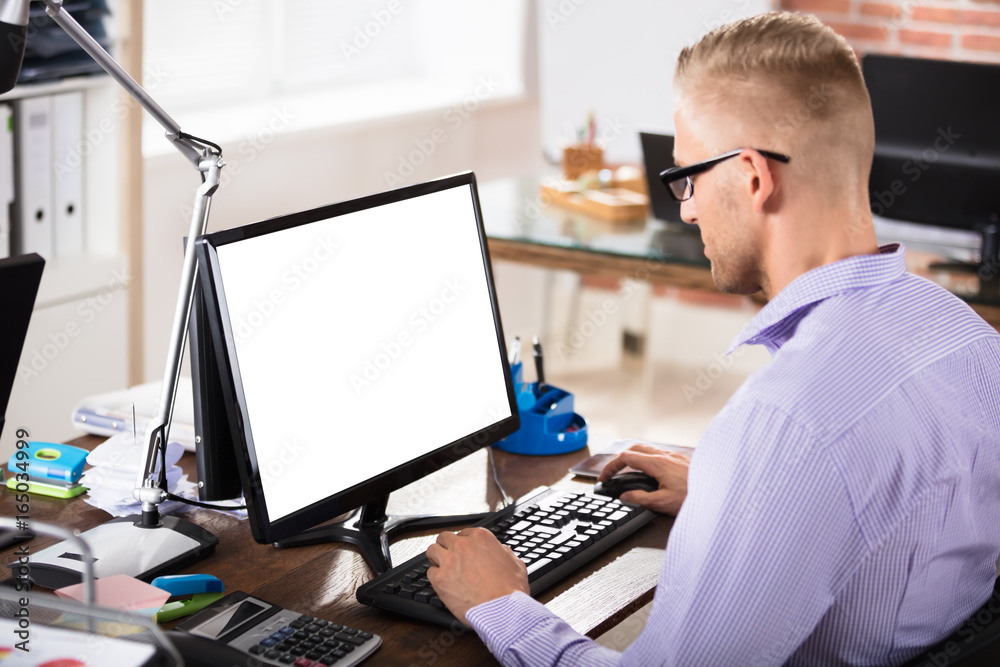 Businessman Using Blank Computer