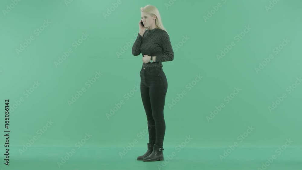 a young woman is arguing on the phone a young woman is arguing on the phone