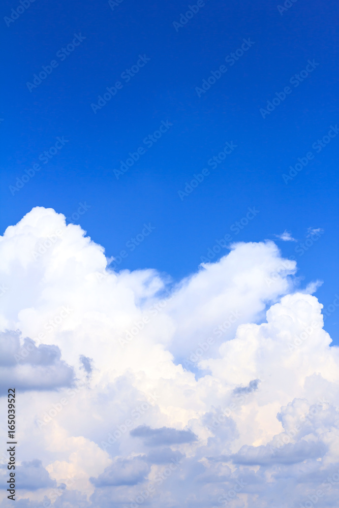 Blue sky background with white clouds on sunny summer or spring day. Blue sky background with white clouds on sunny summer or spring day.
