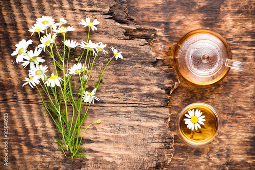 Herbal tea with chamomile flowers. Herbal medicine.