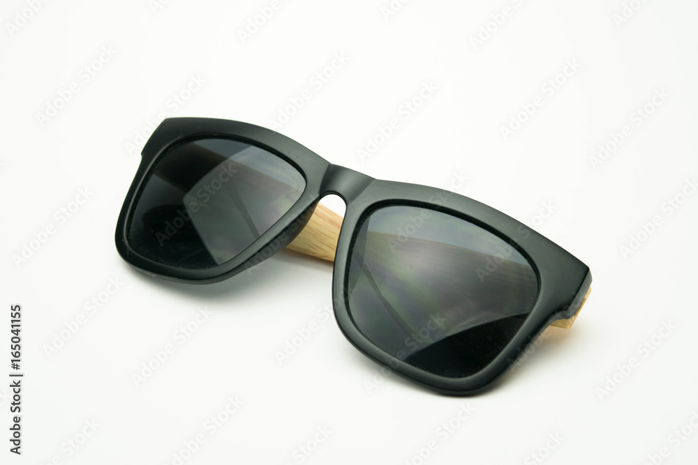 black sunglasses with wooden legs on white background black sunglasses with wooden legs on white background