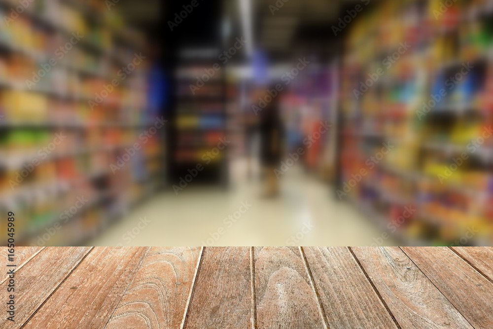 Empty Wooden Board with Blurred Supermarket Background. Suitable for Products Display.