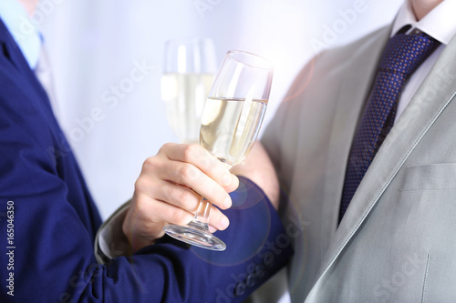 Two homosexuals are going to drink champagne © Africa Studio