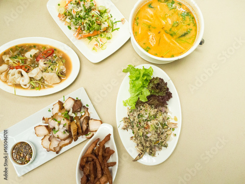 Asian food served on the table, top view, Thai food. © decnui