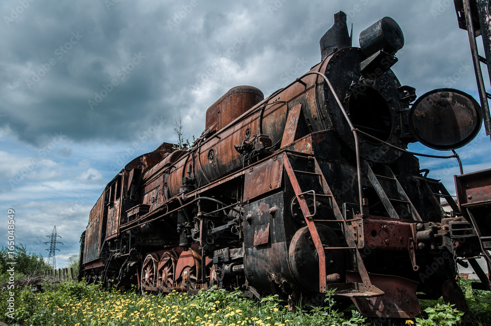 Naklejka premium Old abandoned industrial locomotive