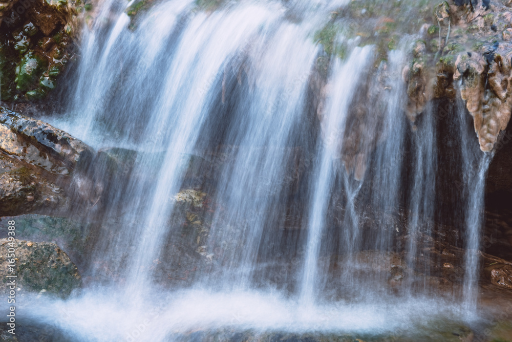 Close-Up Of waterfall Flowing Through Rocks in Lishui,Zhejiang province,China. Close-Up Of waterfall Flowing Through Rocks in Lishui,Zhejiang province,China.