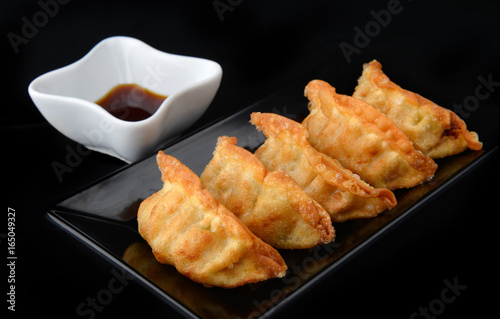 Deep fried gyoza crispy and golden colour. photo