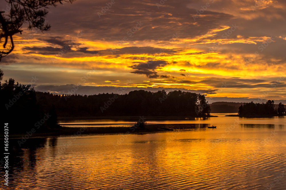 Orange Sunset on Lake Ladoga in the Forest, St. Petersburg, Leningrad Region, Republic of Karelia, Russia