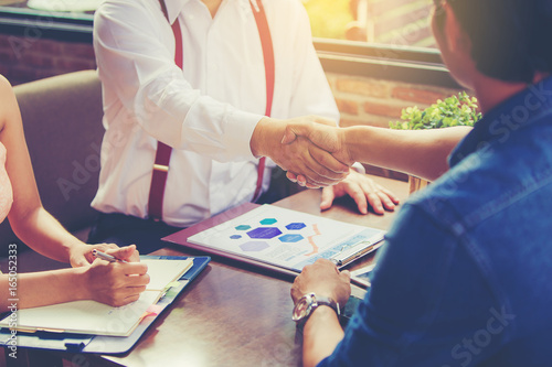 Business People Hand Shake in business meeting.