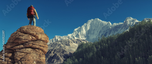 Young man up the mountain