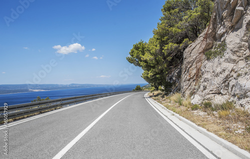 Asphalt highway in a sunny day. photo