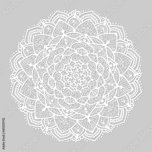 White round mandala of lines on grey background