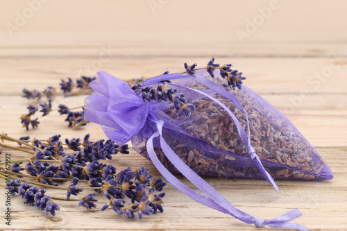 Fototapeta Naklejka Na Ścianę i Meble -  Dried flowers of lavender in transparent bag natural reppelent
