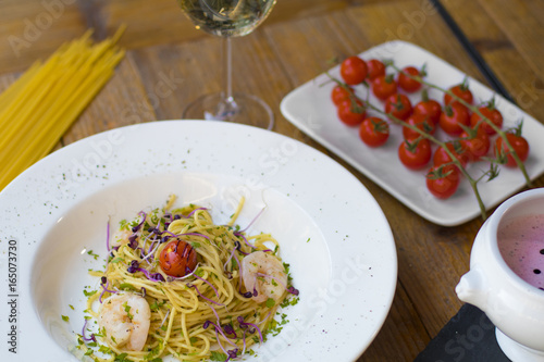 Aglio e olio (spaghetti with oil and garlic) with shrimps and strawberry soup with mascarpone