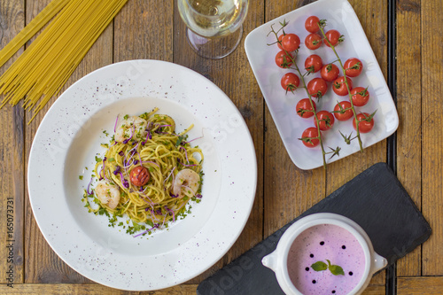 Aglio e olio (spaghetti with oil and garlic) with shrimps and strawberry soup with mascarpone