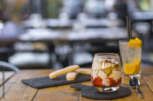One serving of strawberry tiramisu in an italian restaurant